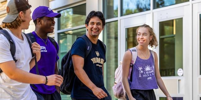 Group of students walking on campus